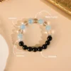 Black Obsidian, White Crystal, and Aquamarine Beaded Bracelet