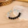 Black Obsidian, White Crystal, and Aquamarine Beaded Bracelet